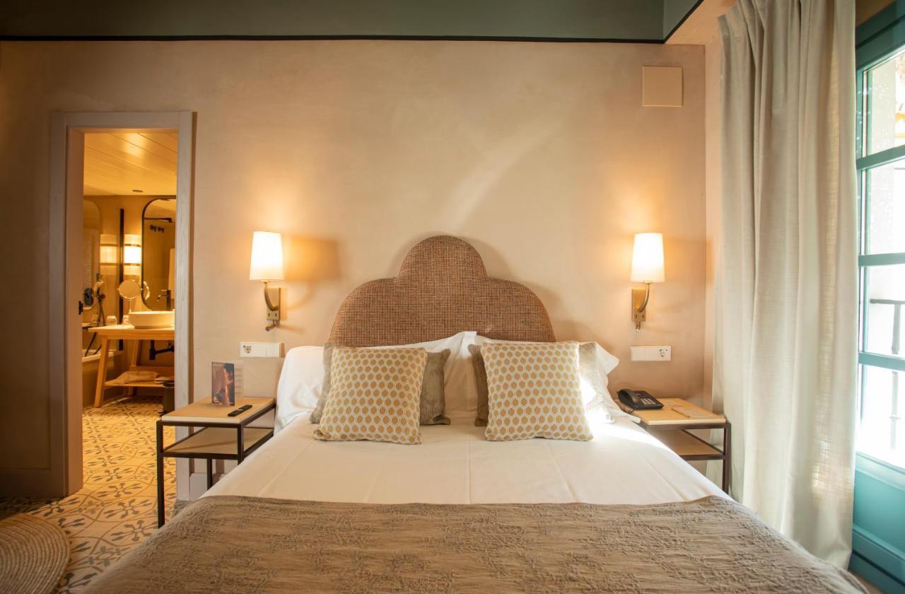 โอสเปส ลาส กาซัส เดลเร เด บาเอซา โฮเทล Hotel เซบีญา ภายนอก รูปภาพ