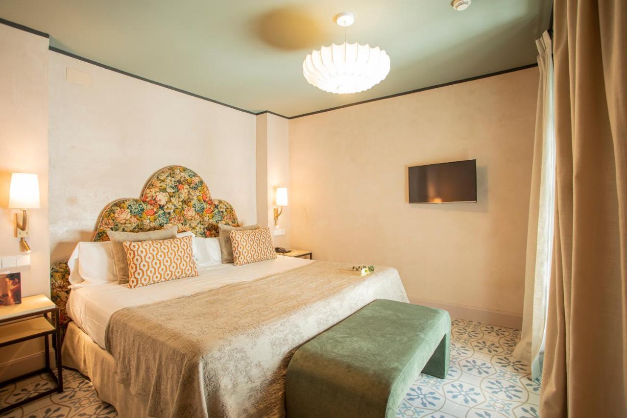 โอสเปส ลาส กาซัส เดลเร เด บาเอซา โฮเทล Hotel เซบีญา ภายนอก รูปภาพ