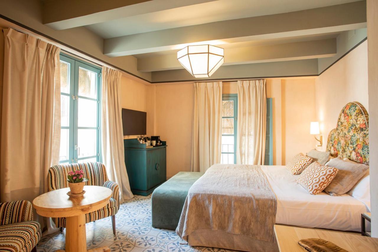 โอสเปส ลาส กาซัส เดลเร เด บาเอซา โฮเทล Hotel เซบีญา ภายนอก รูปภาพ