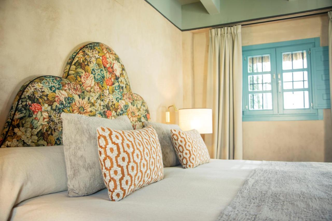 โอสเปส ลาส กาซัส เดลเร เด บาเอซา โฮเทล Hotel เซบีญา ภายนอก รูปภาพ
