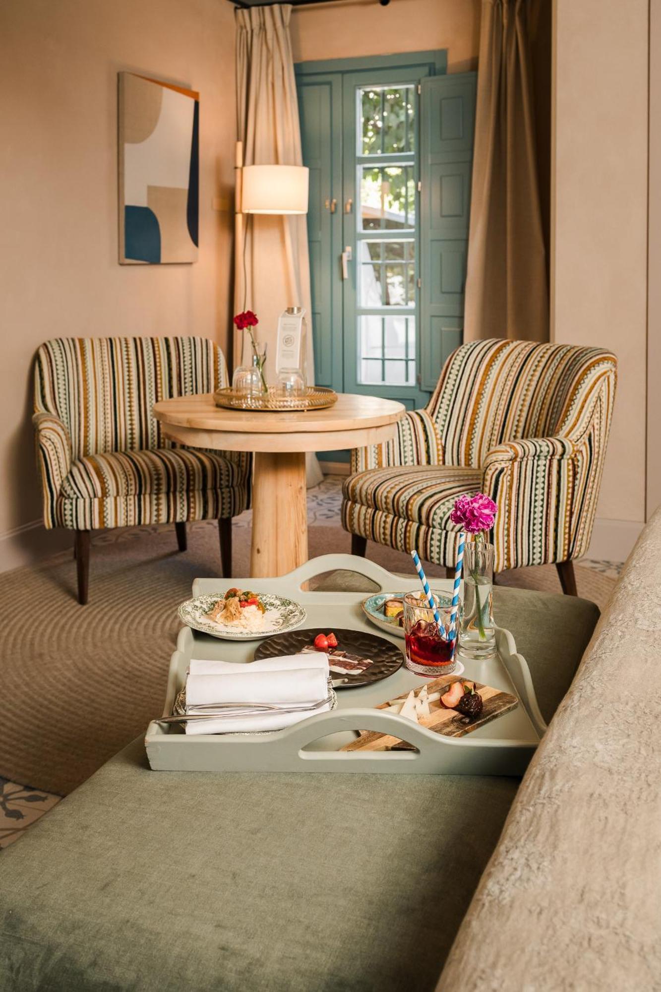 โอสเปส ลาส กาซัส เดลเร เด บาเอซา โฮเทล Hotel เซบีญา ภายนอก รูปภาพ